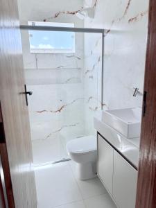 Ένα μπάνιο στο Flat Mucuri - Praia centro