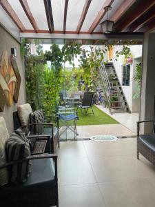 Et opholdsområde på Hostel Recanto Verde + 14 billeder