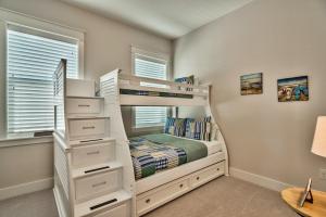 a white bunk bed in a room with windows at Prominece 30A - Coasting Inn in Watersound Beach +39 photos