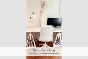 TV a/nebo společenská místnost v ubytování Ferienwohnung "Hannes & Toni", Urlaub in der Pfalz, S-Bahn 2 Min, WLAN & Parkplatz kostenlos, hundefreundlich