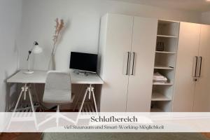 Kuchyň nebo kuchyňský kout v ubytování Ferienwohnung "Hannes & Toni", Urlaub in der Pfalz, S-Bahn 2 Min, WLAN & Parkplatz kostenlos, hundefreundlich + 14 fotografií