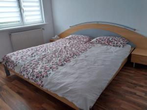 a bed with two pillows on it in a bedroom at Waldblick in Hirschhorn in Hirschhorn