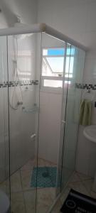 Et badeværelse på Nostra casa Peruibe + 11 billeder