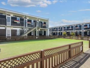 a large lawn in front of a building at 8 person holiday home in Glesborg in Glesborg +32 photos