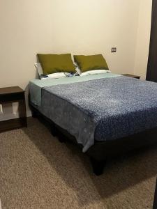 Ένα ή περισσότερα κρεβάτια σε δωμάτιο στο Quillota, Departamento Full Equipado