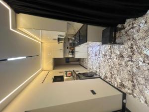 Kuchyň nebo kuchyňský kout v ubytování Luxury apartment