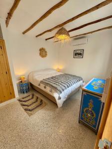 Ένα ή περισσότερα κρεβάτια σε δωμάτιο στο Riad Lalla Naty +12 φωτογραφίες