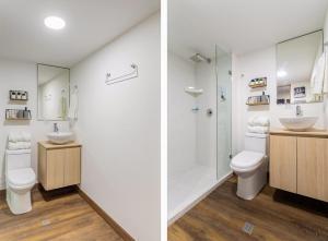 a bathroom with a toilet and a sink and a shower at H103 I Spacious Luxury Duplex I Central in Cali +47 photos