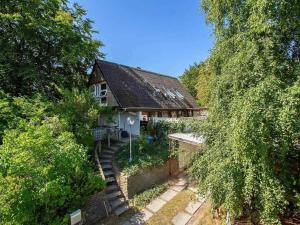 an aerial view of a house in the woods at 5 star holiday home in Hundested in Kulhuse