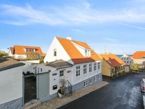 an aerial view of a house with orange roofs at 5 star holiday home in Allinge in Allinge