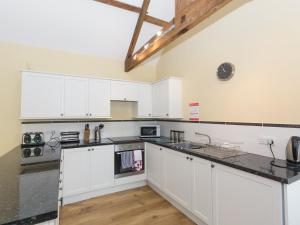 Kuchyň nebo kuchyňský kout v ubytování Westerdale Barn - 27944