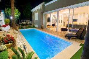 The swimming pool at or close to Private Villa with Heated Pool and Jacuzzi