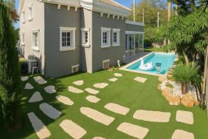 The swimming pool at or close to Private Villa with Heated Pool and Jacuzzi