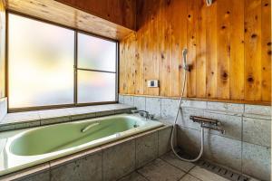 Koupelna v ubytování 那須グランドヴィラ 那須の中心地 屋根付きデッキでBBq カラオケ 自然に囲まれた静かな環境 での団欒 + 27 fotografií