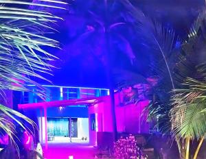 a house with red lights in front of it at Gajananstay beach facing Rooms Gokarna in Gokarn +22 photos