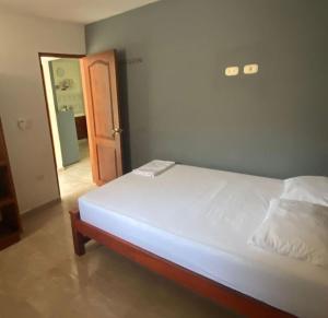 Postel nebo postele na pokoji v ubytování Refugio Marinero