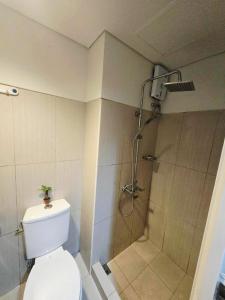 Koupelna v ubytování SHELL RESIDENCES-TOWER B UNIT 1122 by ISLANDFRONT HOSPITALITY