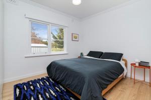 Ένα ή περισσότερα κρεβάτια σε δωμάτιο στο Trent Creek Retreat