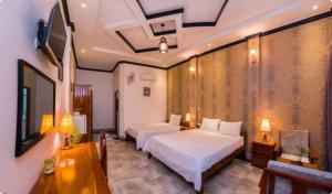 Ένα ή περισσότερα κρεβάτια σε δωμάτιο στο Soksan Villa