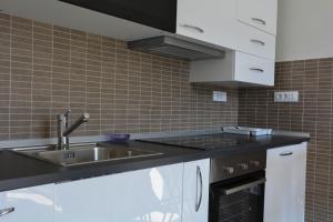 Kuchyňa alebo kuchynka v ubytovaní Nautika Apartment