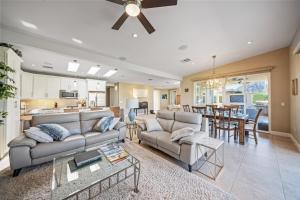 a living room with a couch and a table at Chill-Inn, an Indian Wells Oasis in Indian Wells