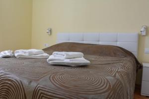 Posteľ alebo postele v izbe v ubytovaní Nautika Apartment