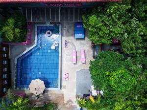an overhead view of a swimming pool in a resort at K-Bunk AoNang Center 18-39 in Ao Nang Beach