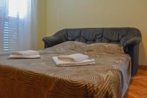 Posteľ alebo postele v izbe v ubytovaní Nautika Apartment