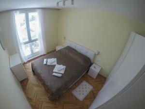 Posteľ alebo postele v izbe v ubytovaní Nautika Apartment
