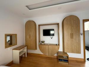 TV a/nebo společenská místnost v ubytování Khách sạn Hương Giang