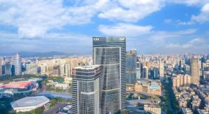 an aerial view of a city with tall buildings at Echarm Hotel Guangzhou Tiyu West Raod Metro Station in Guangzhou
