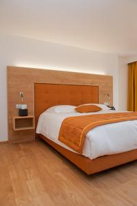 Postel nebo postele na pokoji v ubytování Hotel Le Charme de la Semois