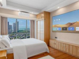 Ένα ή περισσότερα κρεβάτια σε δωμάτιο στο Mandolin Intelligent Hotel Jinagmen +279 φωτογραφίες