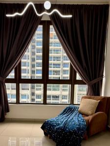 Postel nebo postele na pokoji v ubytování House Of Adhinata Homestay