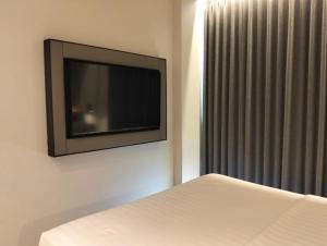 Μια τηλεόραση ή/και κέντρο ψυχαγωγίας στο Beezie Hotel +20 φωτογραφίες