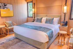 Ένα ή περισσότερα κρεβάτια σε δωμάτιο στο Tsuru Yoshikawa Onsen