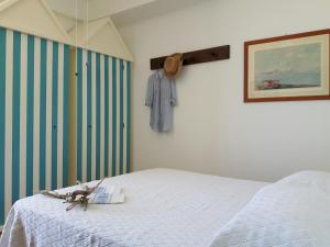 Una cama o camas en una habitación de Maredentro
