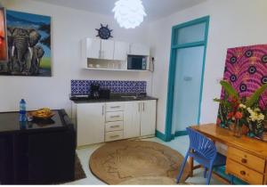 Η κουζίνα ή μικρή κουζίνα στο Beach Apartment