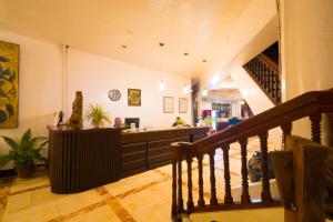 TV a/nebo společenská místnost v ubytování Lisland Rainforest Resort