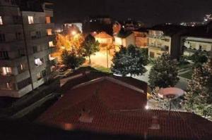 an overhead view of a city at night at Lacky-ca in Prokuplje