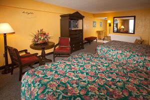 Vuode tai vuoteita majoituspaikassa Daytona Beach Hawaiian Inn