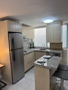 Кухня или мини-кухня в Departamento Ejecutivo de Lujo
