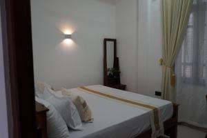 Postel nebo postele na pokoji v ubytování Avira Cozy Corner + 1 fotografie