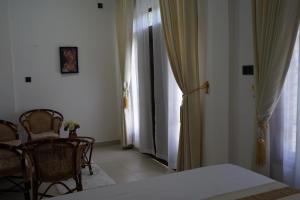 Postel nebo postele na pokoji v ubytování Avira Cozy Corner