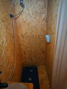 a small bathroom with a shower and a toilet at Bongalow bamboo in San Giorgio a Liri +25 photos