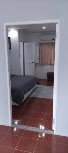 Postel nebo postele na pokoji v ubytování Greenery House