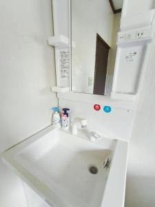 Koupelna v ubytování プリンセスハウス 6