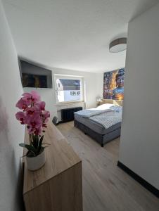 Postel nebo postele na pokoji v ubytování Pension Wolke-7