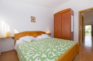 Ein Bett oder Betten in einem Zimmer der Unterkunft Villa Marianne