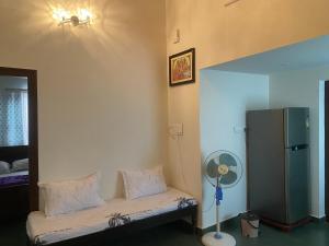 Posezení v ubytování Sri Ranga Nilaya